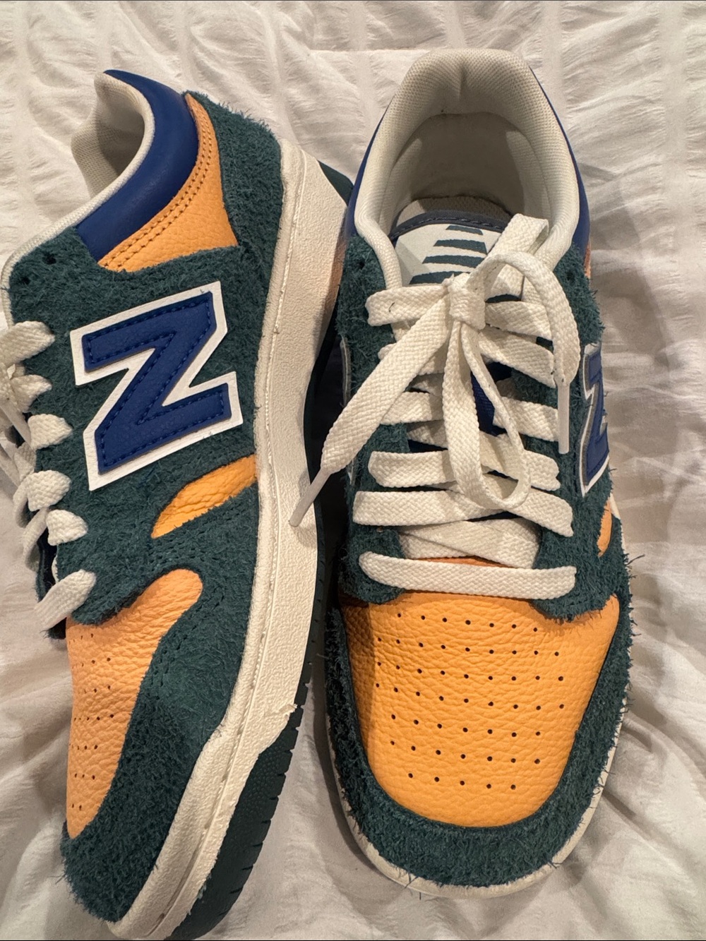 New Balance Two-Tone Suede & Leather Sneakers in Teal and Mustard. These are 🔥